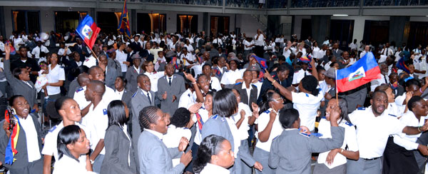 The congregation at the anniversary celebrations dances in praise to God