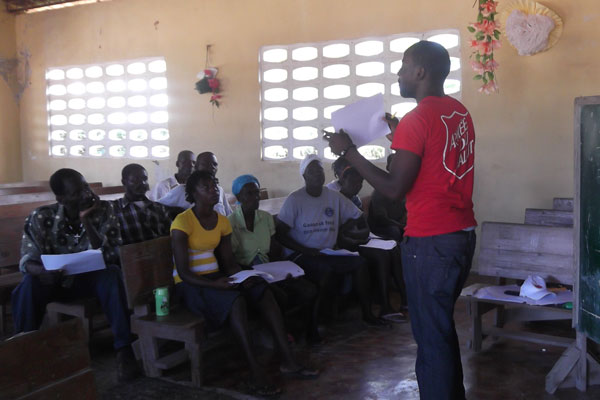 Odierce Louis, technical co-ordinator for agriculture, conducts a training session on business plans for small and medium enterprises