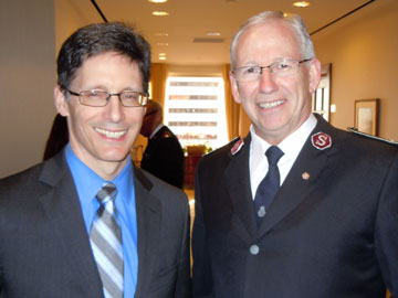 Board member Robert McFarlane with Commissioner Brian Peddle 
