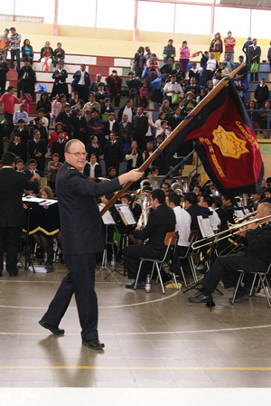 General André Cox waves the flag
