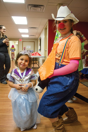 Brianna Mulder and Kaitlin Valentino show off their costumes at a special Halloween edition of Messy Church