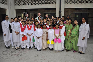 The General and Commissioner Cox with children from the Girls' Boarding Hostel in Lahore