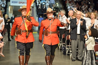 Two RCMP officers escort General and Commissioner Cox as they are welcomed to CongressTwo RCMP officers escort General and Commissioner Cox as they are welcomed to Congress