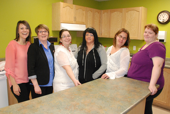 From left, Penney Simms, Jane Ash, Judy Young, Crystal Earle, Krista Hynes and Patricia Parsons gather in the Fresh kitchen