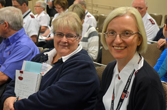 From left, Joyce Kristjannson, executive director and director of care at Winnipeg's Golden West Centennial Lodge, and Mjr Brenda Critch, DDWM, Prairie Div, share together during the conference