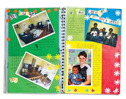 A scrapbook, created by Marlie's caregivers at the babies home, chronicles her early life in South Africa