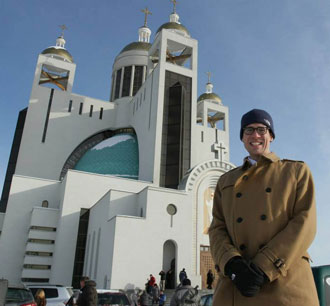 Ambassador Bennett stands in front of the Ukrainian Greek-Catholic Patriarchal Sobor (Cathedral) of the Resurrection of Christ in Kyiv, Ukraine