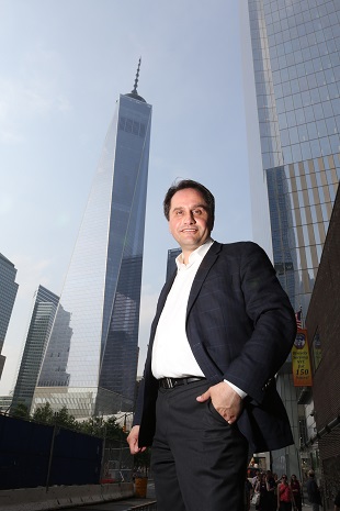 Nick Zigomanis with Tower 1 of the new World Trade Center in the background