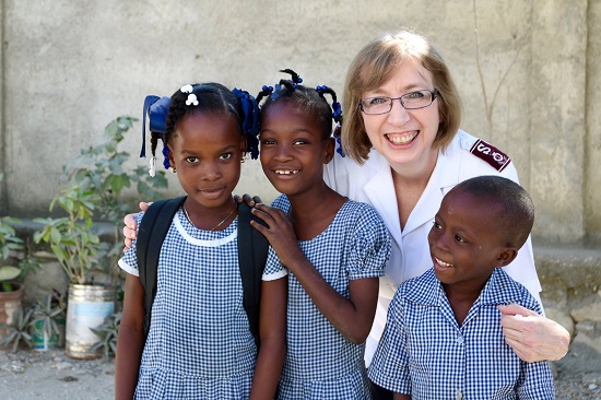 Commissioner McMillan meets children who attend a Salvation Army school in Haiti