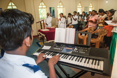 Worship at Siyambalangamuwa Corps, located a few hours outside Colombo, the nation's capital.   