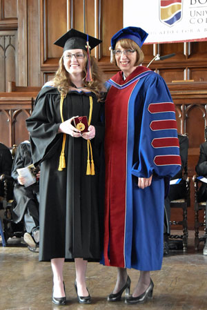 Commissioner Susan McMillan awards Emma Gerard with the Chancellor's Medal