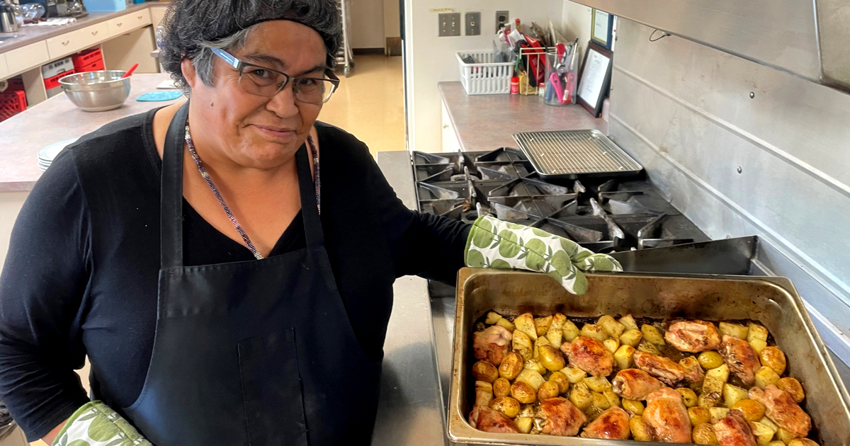 Pauline Collins in the kitchen. In addition to shelter, the Cornerstone program also offers a variety of life skills activities (Photo: Naema Maier)