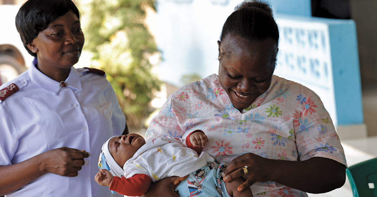 A nurse gives a baby a vaccination at the William Booth Health Centre in Monrovia, Liberia
