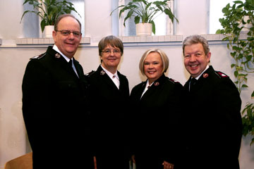 The Chief of the Staff (Commissioner André Cox), Commissioner Silvia Cox, Colonel Eva Kleman and Colonel Johnny Kleman