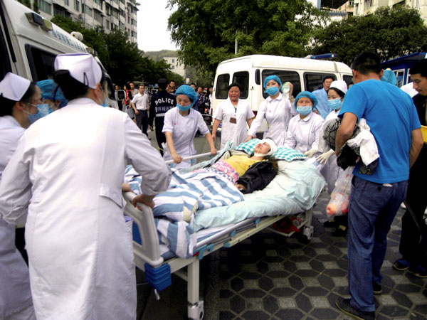 Medical staff treat an earthquake victim in Sichuan, China