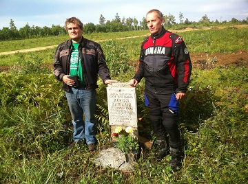Craig and Sergei visit a memorial for a lost biker, near Svobodny, Amur Region, Russia