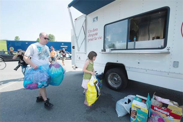 A Salvation Army Community Response Unit provides assistance after a train derailed in Lac-Megantic, Que.