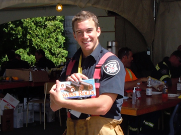 A first responder receives a snack from The Salvation Army's canteen in Lac-Mégantic