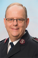 Commissioner André Cox