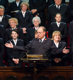 General André Cox addresses the congregation