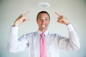 Man points to a halo on his head