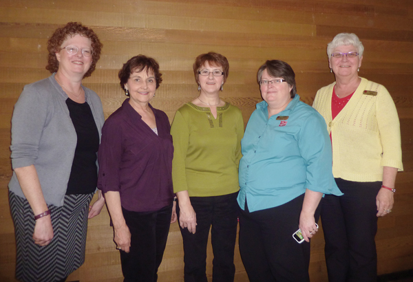 Patricia Roed, Connie Preston, Marguerite Gilbert, Captain Karen Taylor, corps officer, and Betty Tiede enjoy women's fellowship at Ocean Crest Community Church