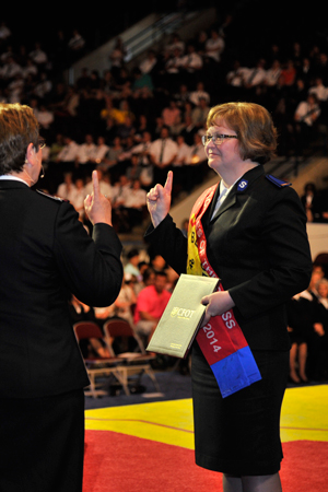 Lieutenant Sharon Tidd is commissioned by Commissioners Brian and Rosalie Peddle