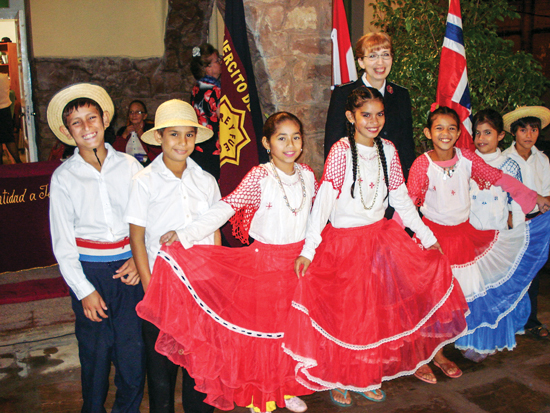 Neighbourhood children perform a typical folk dance at the inauguration of a new building in the city of Asunción, Paraguay. The building includes a student residence, an educational support program for high-school students called Youth Space and an outpost called Rayito de Luz