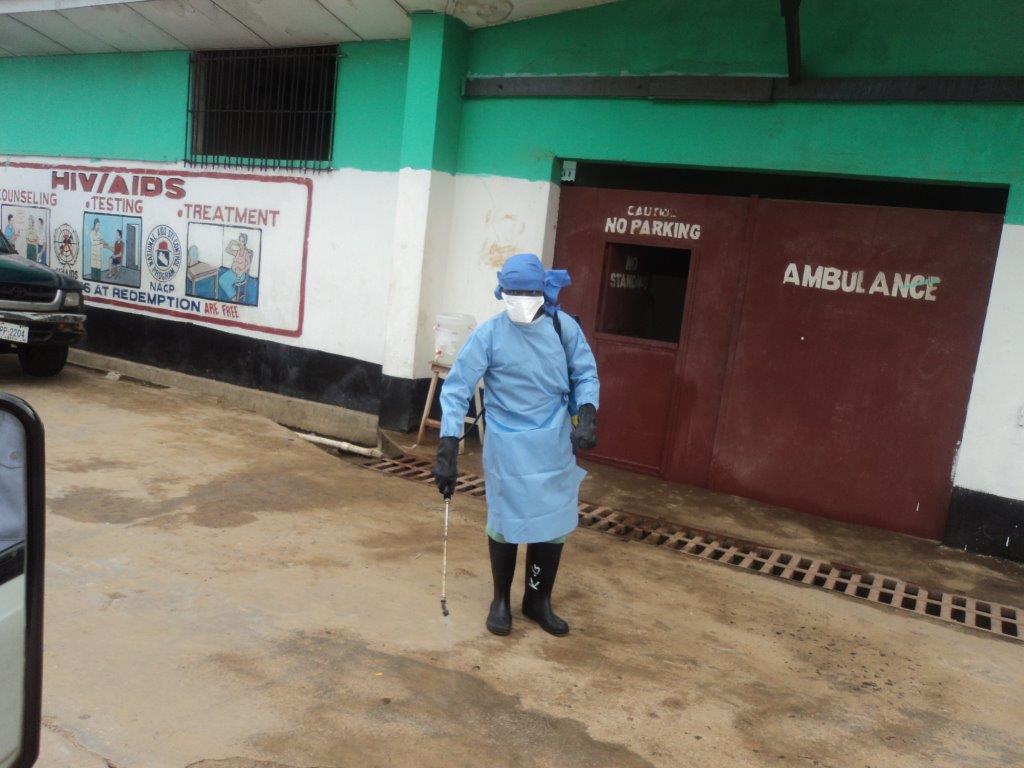 Volunteer dressed in protective gear