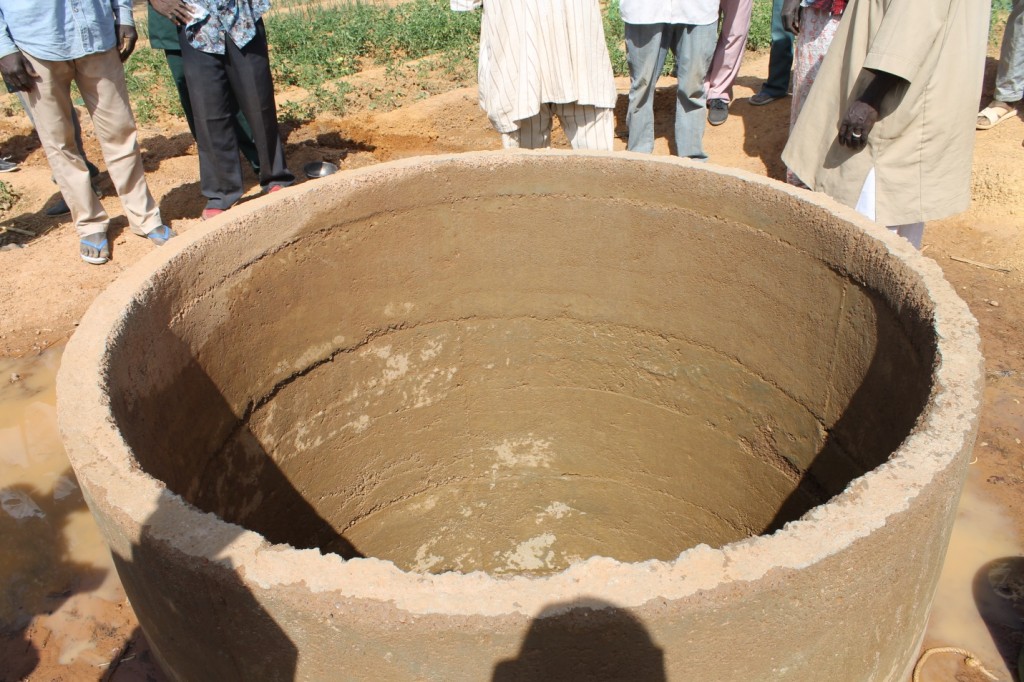 In Burkina Faso, people must walk long distances to collect water from a well, which they need to boil. During the dry season (November to April), the well is empty and they must travel even farther to find water, and carry the heavy jugs home. 