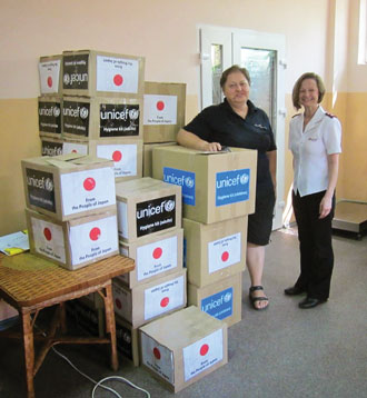 Cpt Irina Hohotva, CO, Kirovograd, and Mjr Annette Rieder-Pell are ready to distribute packages in Kirovograd