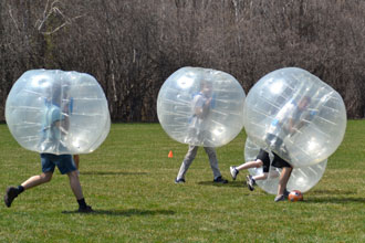 Young Salvationists enjoy a game of bubble soccer