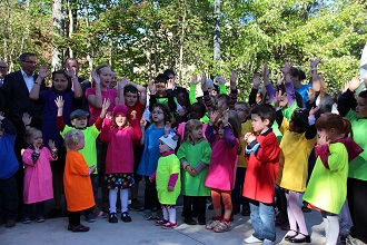 Children gather for the official opening of Small Blessings