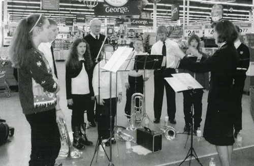 Robert lends a hand to the Orillia young people's band, playing at Walmart in December 2012