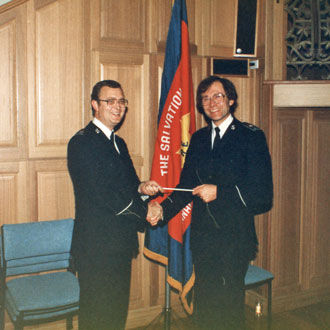 Robert hands over the Canadian Staff Band baton to Brian Burditt 1985
