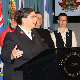 Major Shari Russell speaks at the ecumenical press conference on Parliament Hill on March 30, 2016