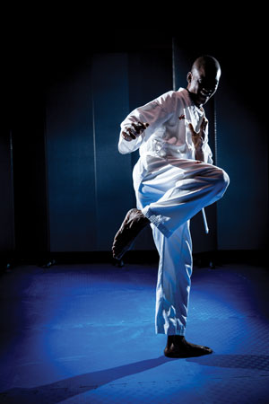 Oliver Kamama shares a taekwondo move