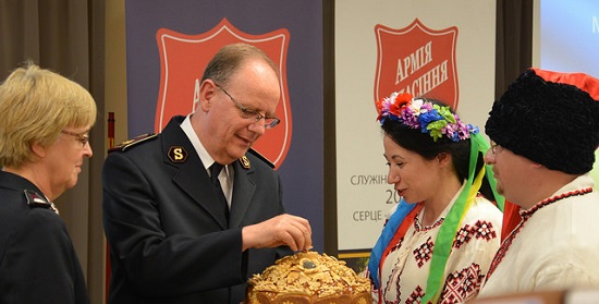 The General and Commissioner Silvia enjoy a traditional Ukrainian welcome