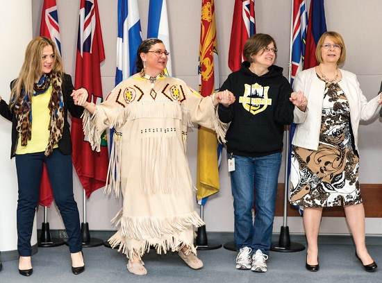 Mjr Shari Russell leads a round dance at a chapel service at territorial headquarters in April