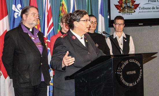 Mjr Shari Russell declares the Army's commitment to the Truth and Reconciliation Commission's Call to Action 48 at a press conference on Parliament Hill in March