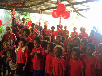 Children take part in the World AIDS Day service