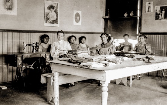 A sewing class at the Brandon residential school, circa 1900