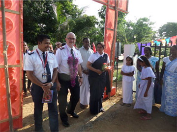 The traditional march to the site of one of the new wells