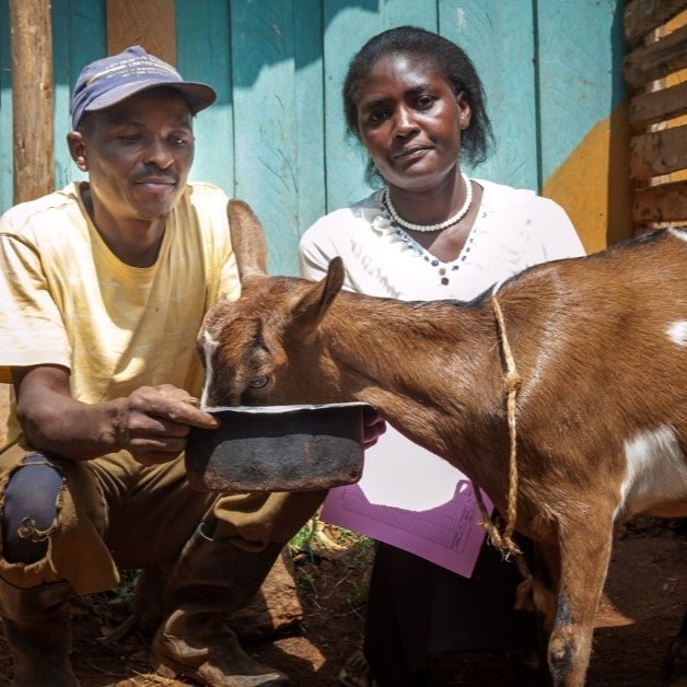 Family with goat.