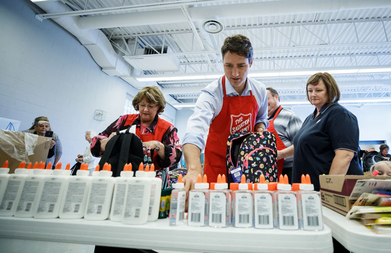 Prime Minister Justin Trudeau packs backpacks at Suncoast Citadel