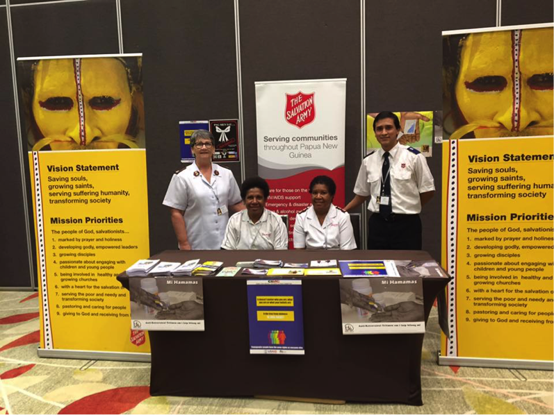 Marco Herrera (right) and Salvation Army staff at the HIV Summit