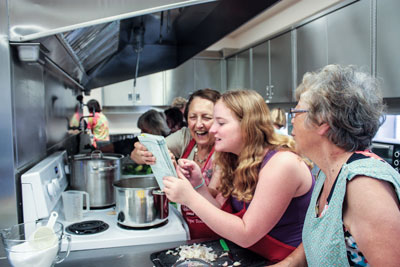 Three women making pickles