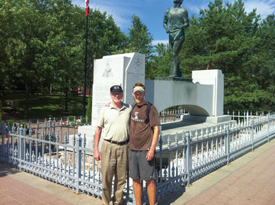 Mjr Ray Harris and his son, Colin, at the Terry Fox Memorial in Thunder Bay, Ont. 