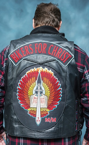 Mark traded in his Satan’s Choice patch for a patch that says "Bikers For Christ"