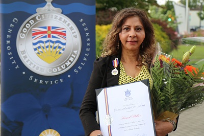 Kamal receives the Medal of Good Citizenship award
